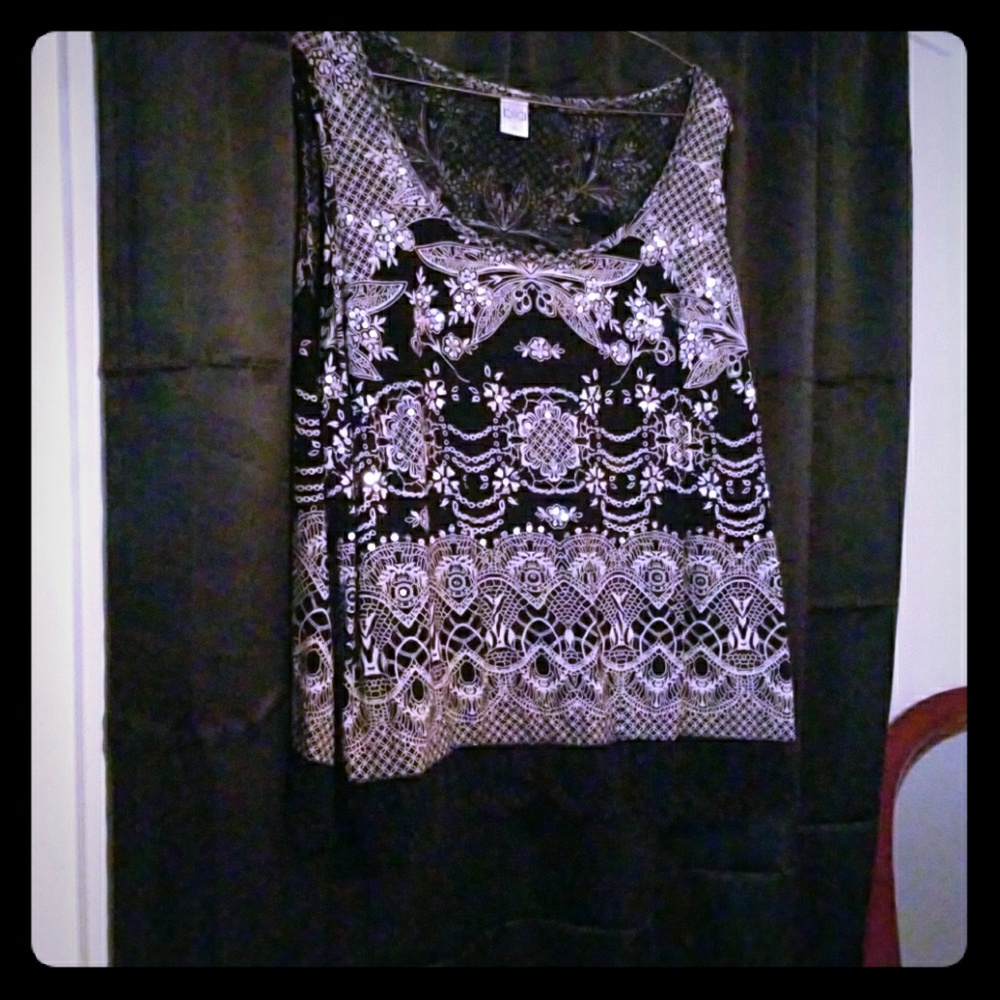 Sleevless very cute and dressy shirt